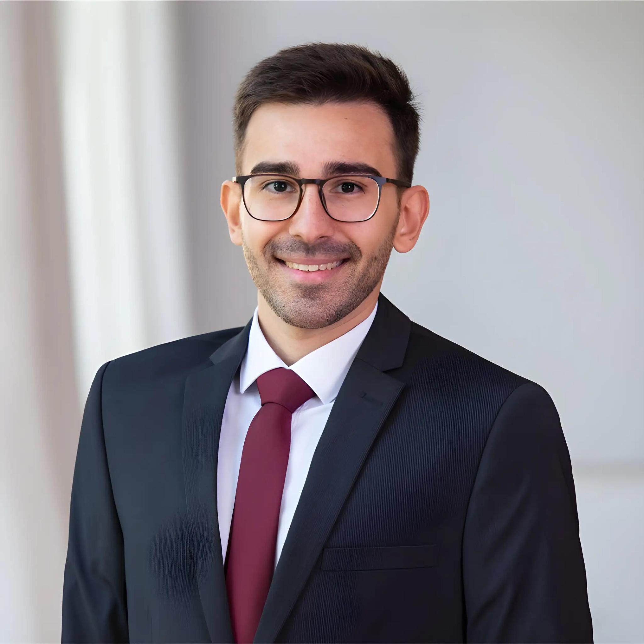 Portrait of a smiling man in suit and tie
