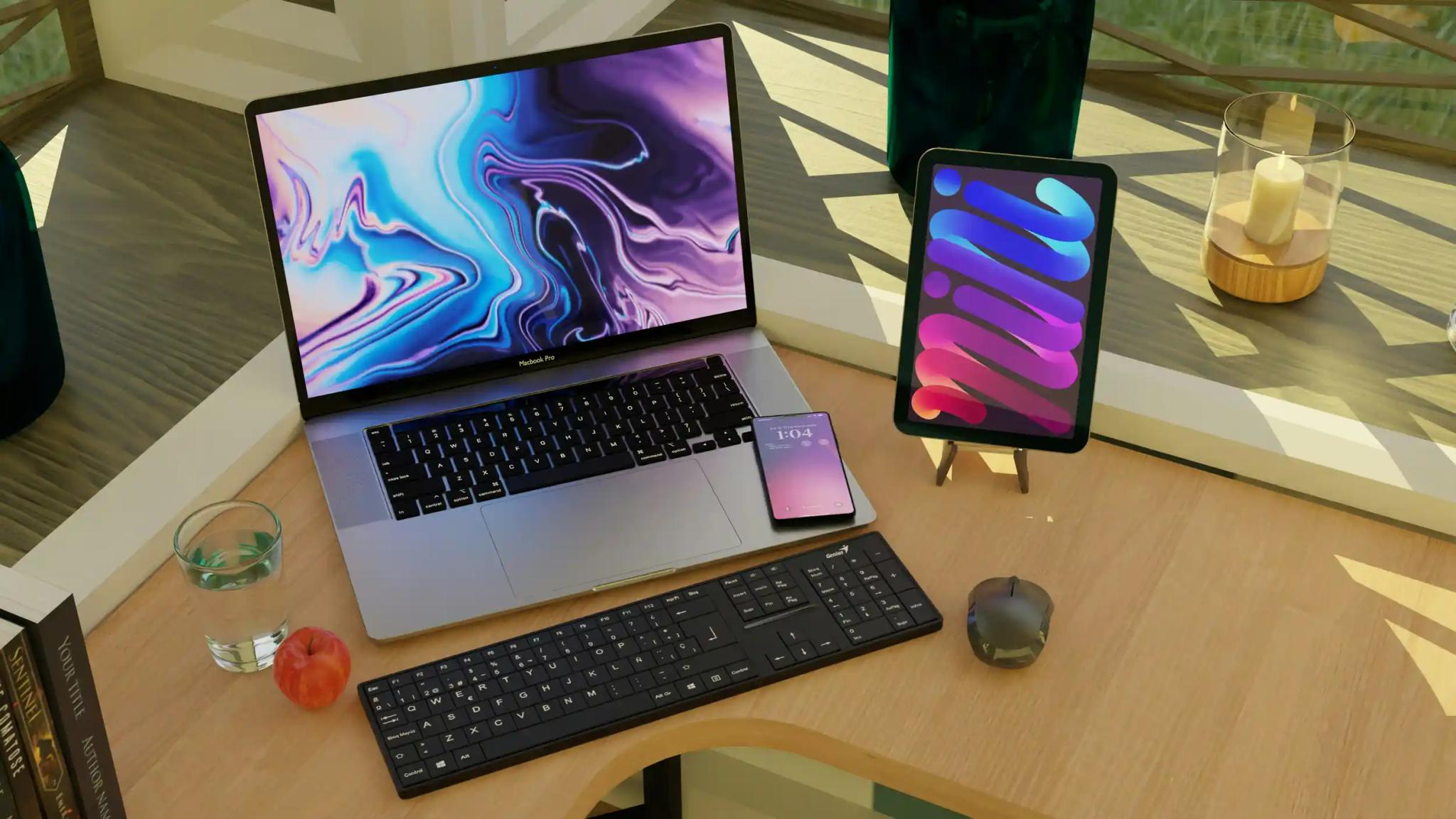 Laptop, tablet, and smartphone on a desk