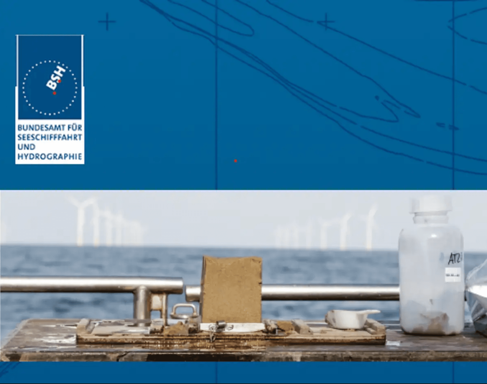 Tisch mit Probenbehältern vor offshore Windrädern und BSH-Logo