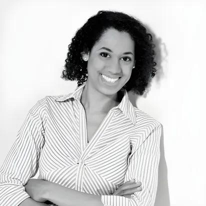 Portrait of a smiling woman with curly hair