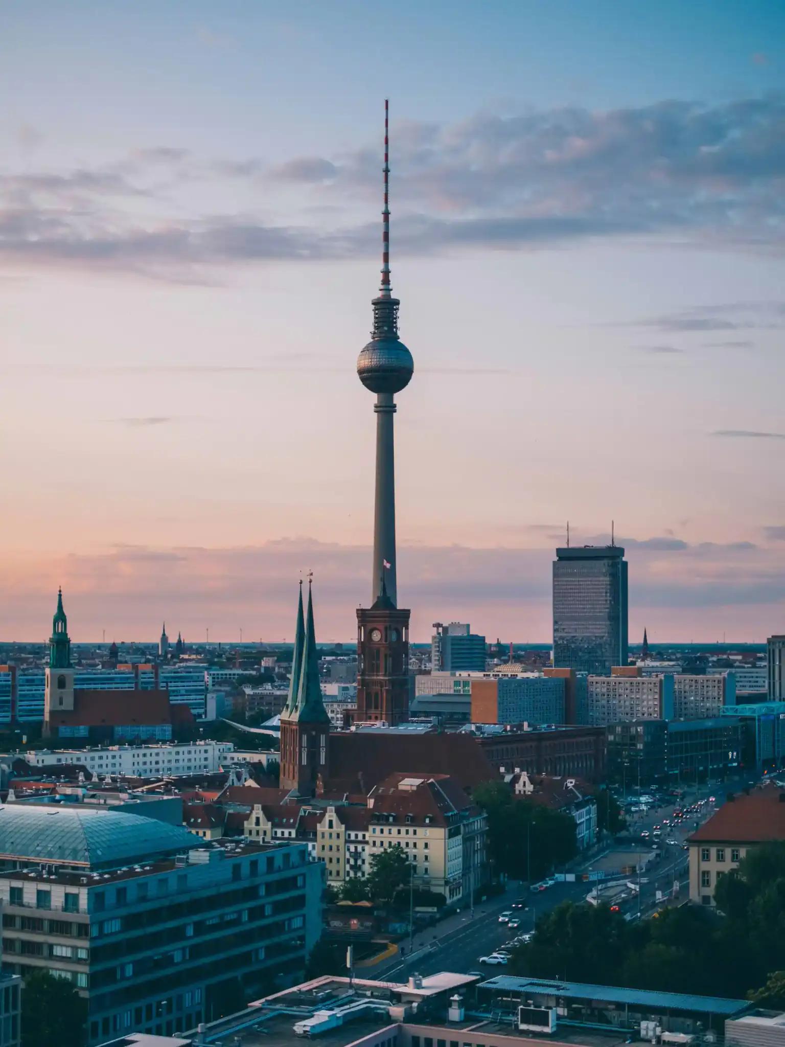 Berlin TV tower and city skyline at sunset